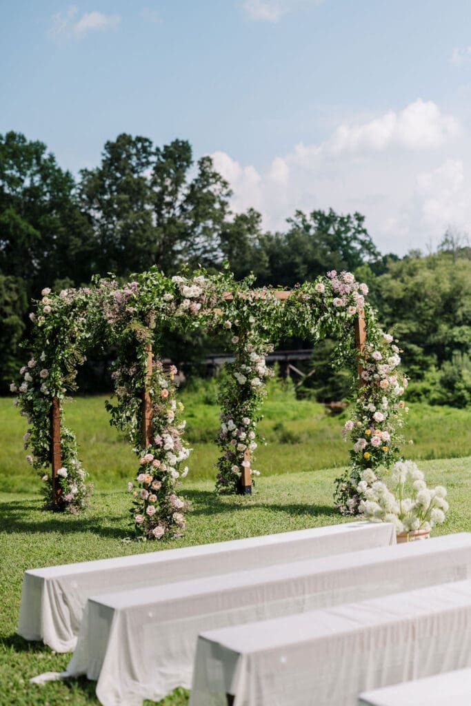 Outdoor wedding ceremony in field outside of Raleigh, North Carolina